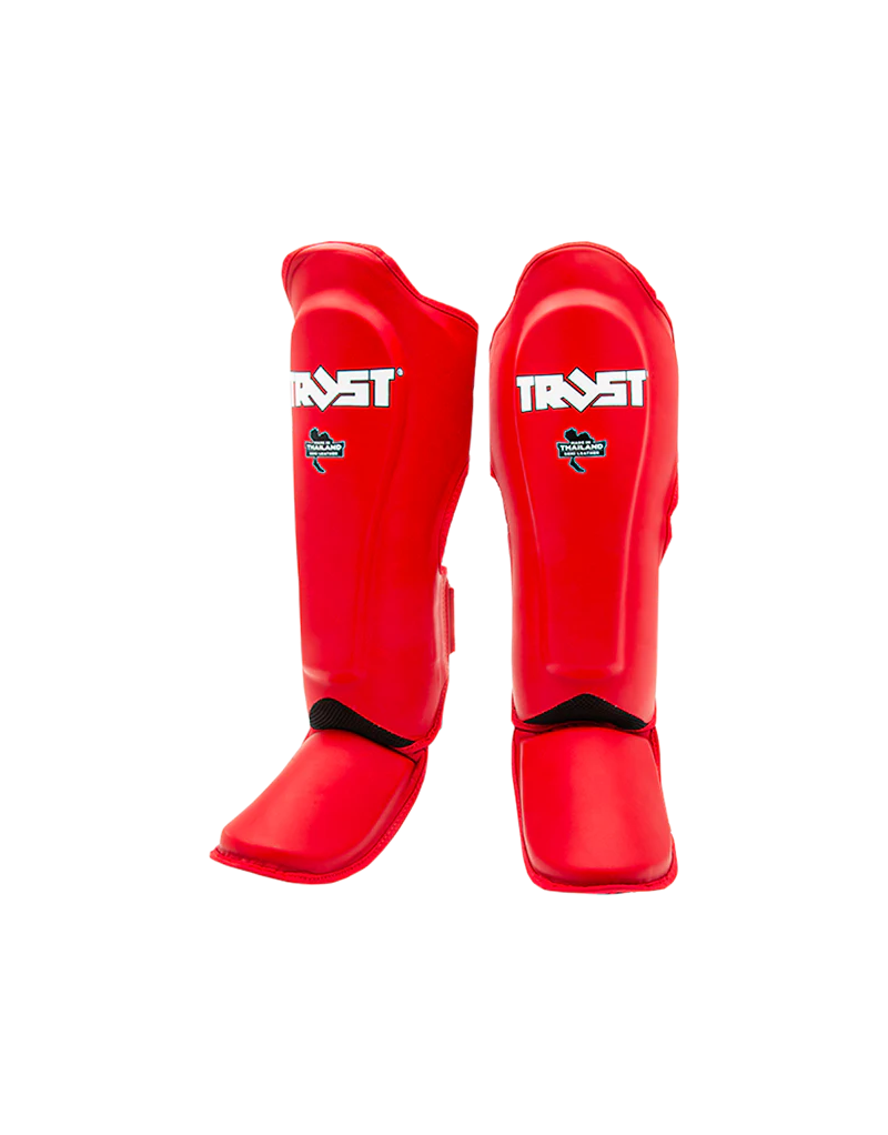 Espinilleras Trust Icon Roja | Potencia y Protección