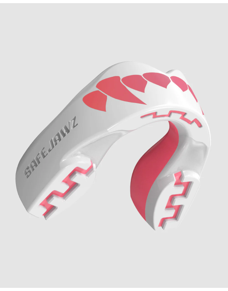 Bucal Safejawz Extro Series Pink Fangz su diseño rosa con colmillos de tiburón, máximo confort y protección profesional.